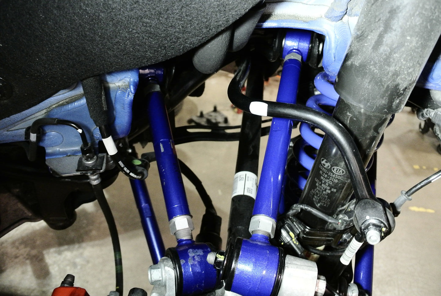 Megan Racing Adjustable Rear Traction Arm (Front Upper, Polyurethane) for Kia Stinger (18-23)/ Genesis G70 (19+)